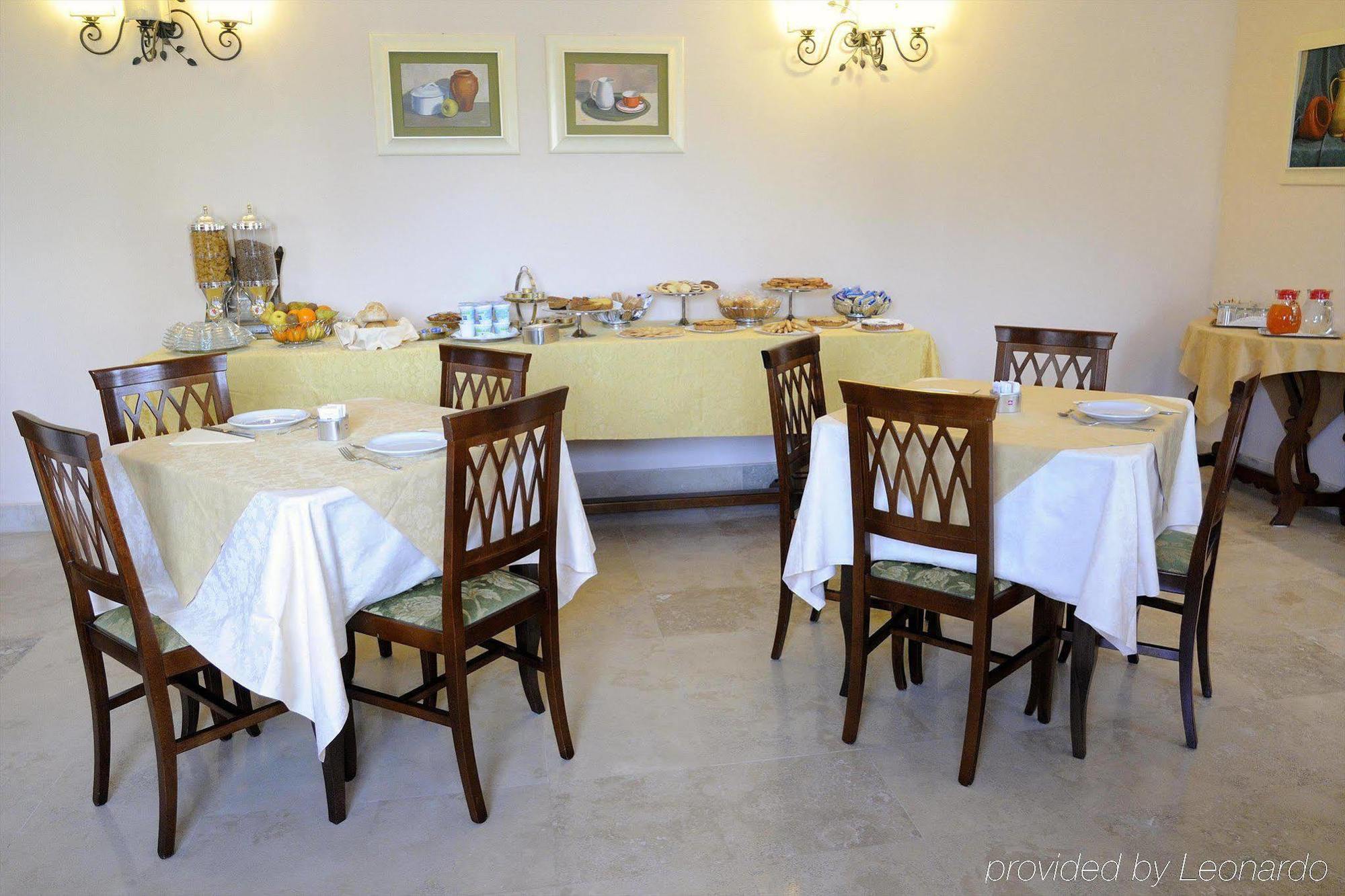 Altea Suites Помеция Ресторан фото